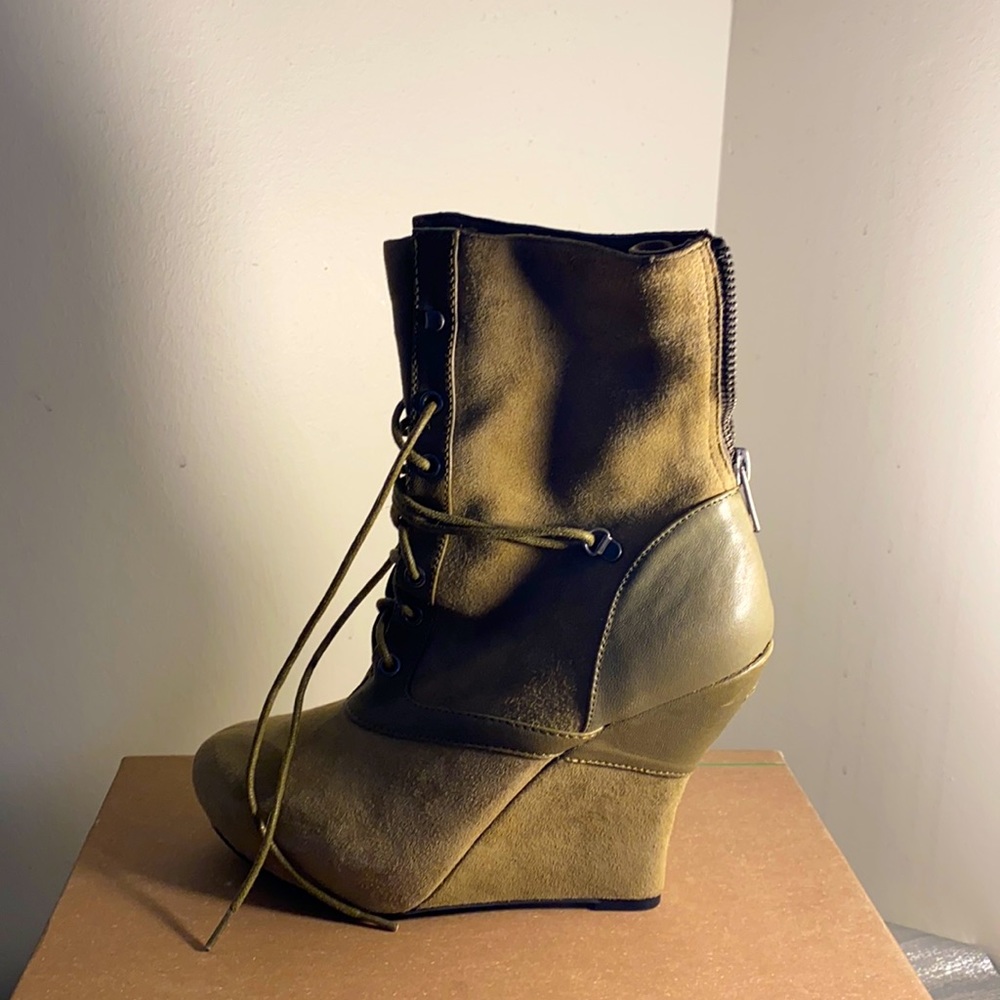 New never worn olive boots with unique heel